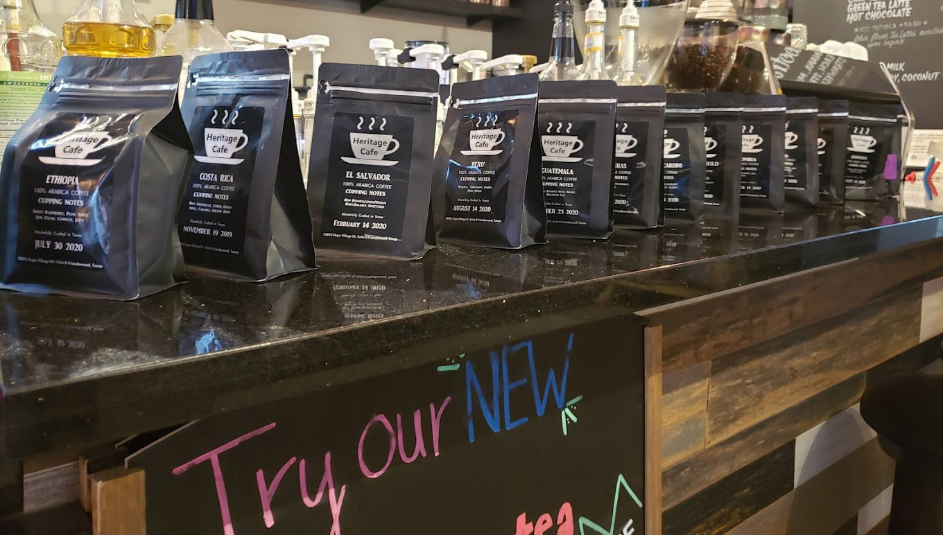 Heritage Cafe coffee bags on the countertop inside the shop